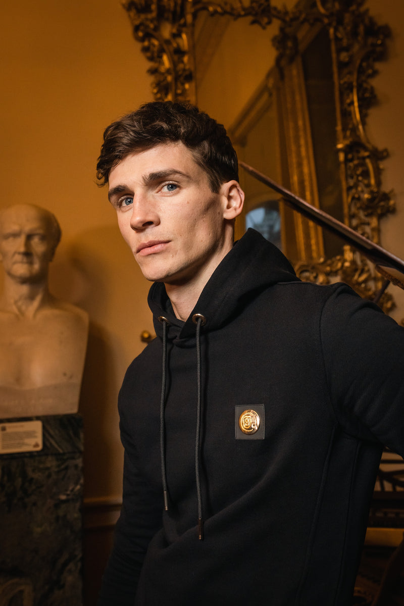 Black Signature hoodie with gold plated badge